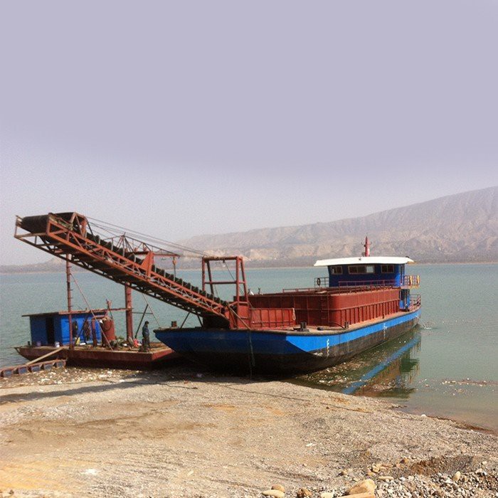 Self propelled self unloading sand and stone carrier for sale